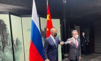 Chinese and Russian Foreign Ministers Hold Talks in Tongxi