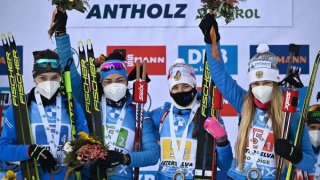 Gold Medals of Russian Biathletes and Scandalous Skier